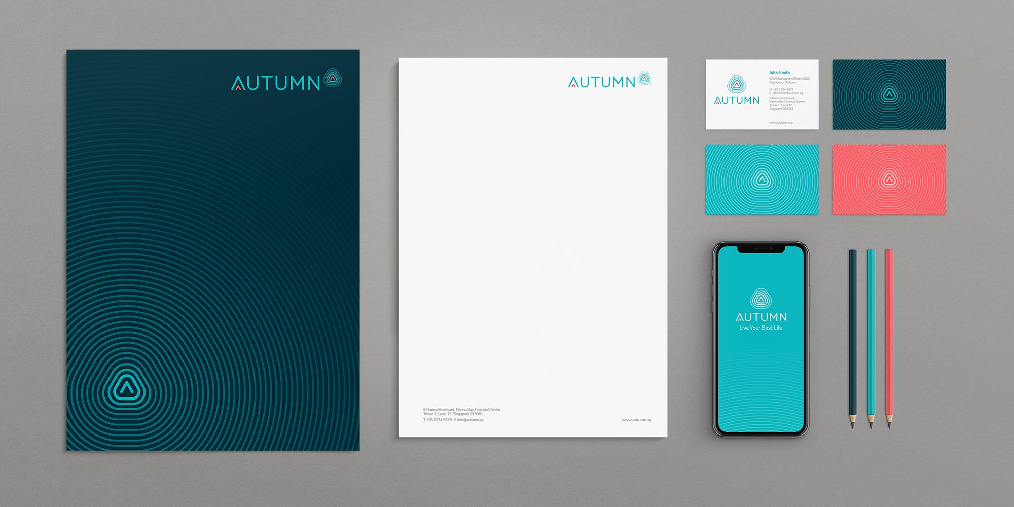Autumn lifestyle brand stationery set with logo, letterhead, business cards, mobile app, and pencils in turquoise and coral.