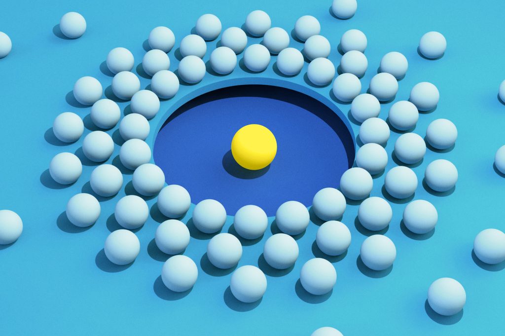 White spheres arranged in an oval formation around a central yellow orb on a vivid blue background, symbolising emotional design building a brand moat beyond AI algorithms