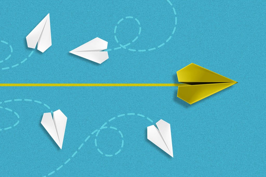 Yellow paper airplane leading others representing creative confidence, leadership and innovation in the Creative Confidence Report 2025